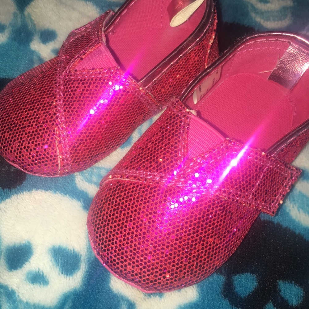 Bright pink sparkly toms